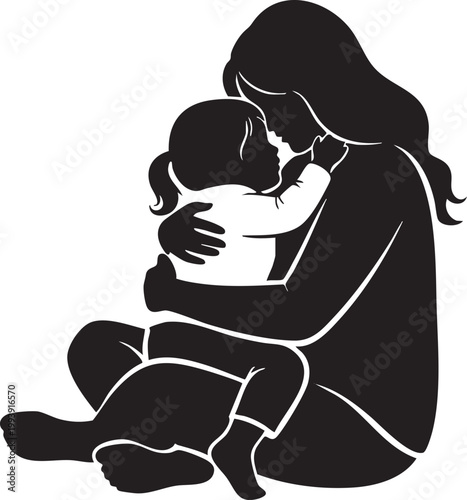 Mother hugging her daughter sitting on the floor with daughter, silhouette