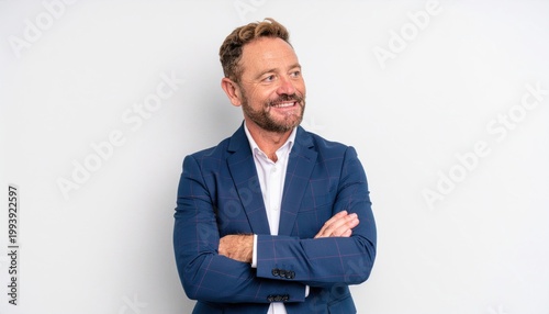 Man in Blazer with Arms Crossed.