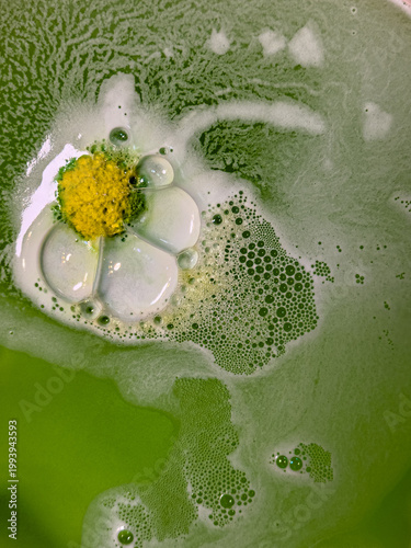 Quadro su tela Sudsy foam from bath bombs produces colorful spacy background plate