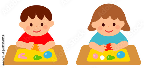 ねんど遊びをする子供