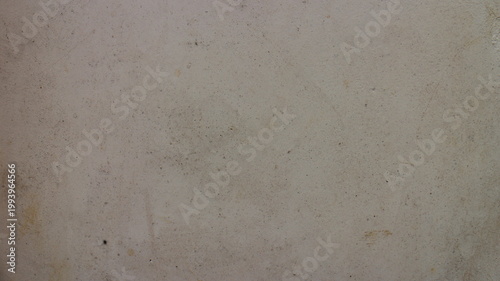 Clean light grey concrete plaster wall texture with subtle grain