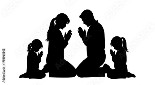 Family in prayer together at home.