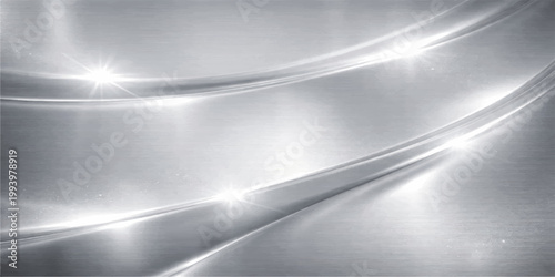 A polished silver brushed metal texture background features a shiny metallic stainless steel surface with a grey chrome pattern reflection and a light grey aluminum material backdrop