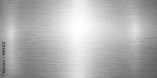 Polished silver brushed metal texture background with a shiny stainless steel surface and industrial grey aluminum plate pattern