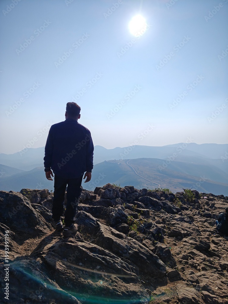 Fototapeta premium Boy standing in mountain 