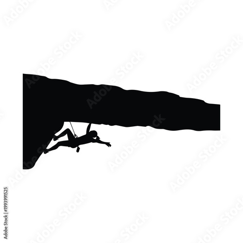 Climber hanging from an overhang on a steep jagged rock cliff surface