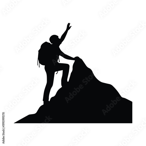 Climber reaching for summit on steep mountain rock face