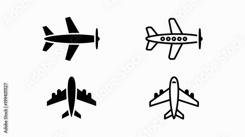 A collection of four black and white airplane icons are displayed showcasing different aircraft designs from a top down perspective high quality professional detailed modern elegant