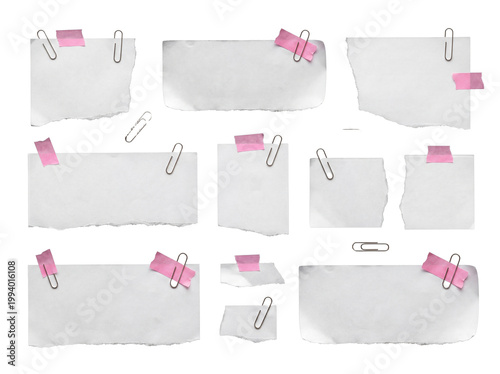 Obraz na płótnie Assorted blank ripped white paper pieces, secured with pink adhesive tape and metallic paper clips