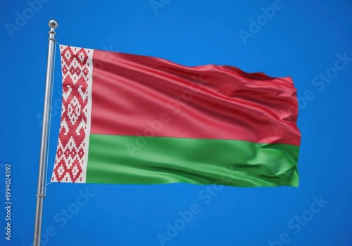 Flag of belarus waving in the wind against a clear blue sky background