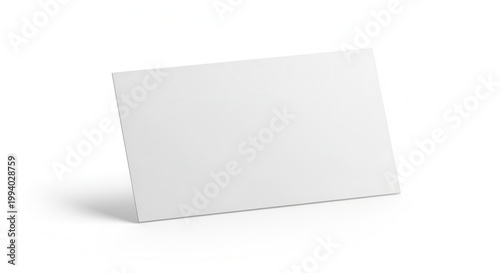 Blank business card mockup standing at a slight angle casts shadow on a white surface, providing a realistic, minimalist style presentation card.