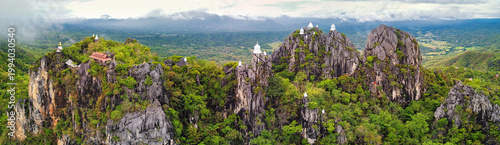 Konstfotografi Panoramic aerial view of Small white pagodas are perched on the high mountains,