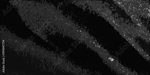 Abstract black and white texture resembling distressed or grainy surface
