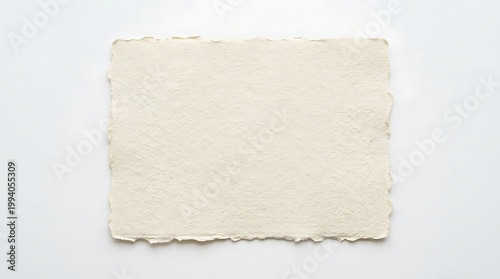 Wrinkled beige paper sheet with torn edges