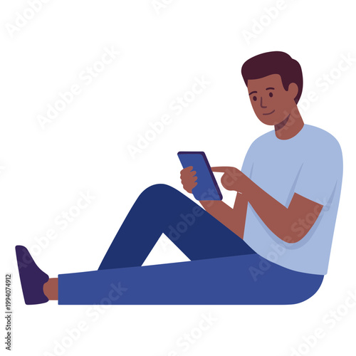 Man sitting on floor using digital tablet indoors