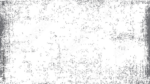 Old distressed black and white surface with cracks and spots creating a dirty grunge texture background