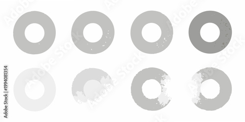 Arrangement of eight gray oval shaped textured forms on white