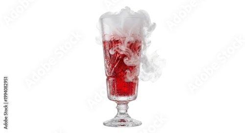Crystal glass of red bubbling potion with dry ice smoke