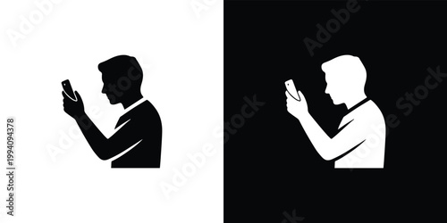 Black and white silhouettes of man looking at smartphone mobile