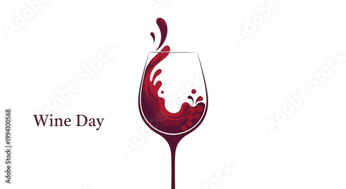 Red wine glass with liquid.