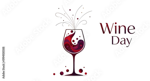 Red wine glass with splashing liquid.