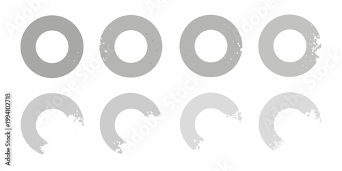 Arrangement of gray oval and semi circular shapes on a white background