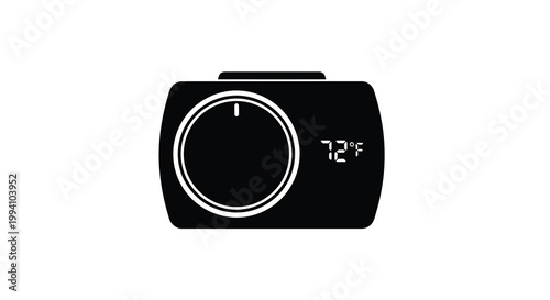 A black smart thermostat displaying a temperature of 72 degrees fahrenheit