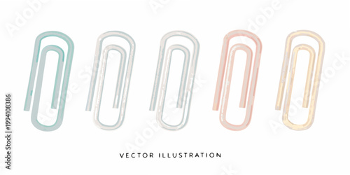 Colorful paper clips arranged in a row on a white background