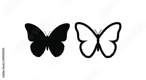 Two butterflies one dark and one light presented as a silhouette