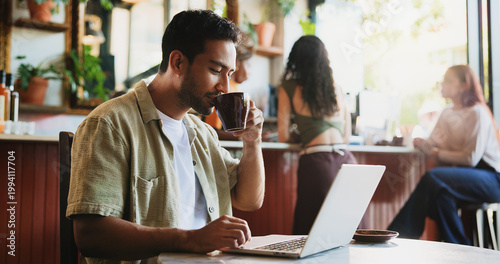 Fotografie Creative, man and coffee with laptop at cafe for remote work, proofreading and editor feedback