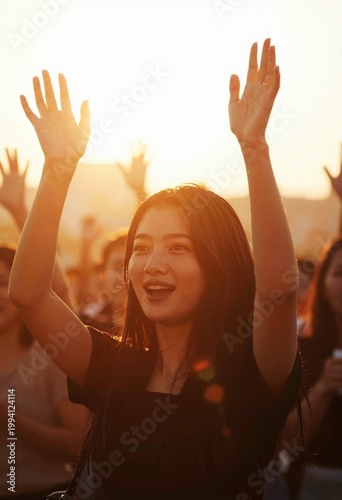 young woman with hands up
