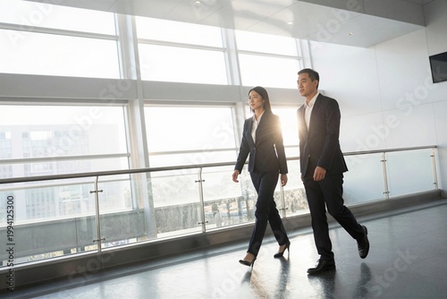 business people walking in the airport