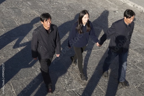 group of people walking on street