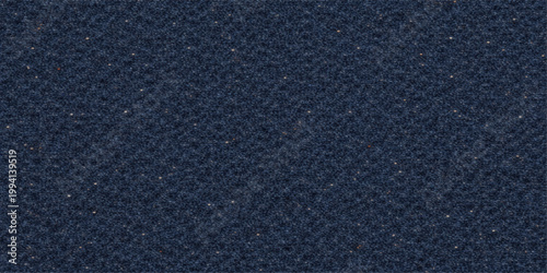 A dark blue denim fabric texture displays a rough macro surface with a detailed textile pattern, creating a deep stone-grey backdrop that resembles the grit of asphalt or leather material