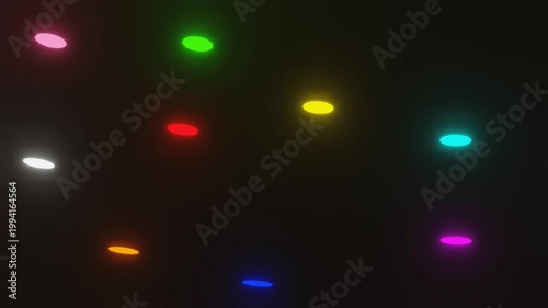 Dancing Colorful Glowing Discs Floating and Rising on Black Background