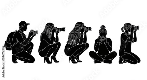 Group of photographers with cameras.
