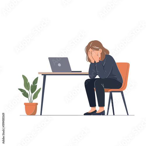 Woman sitting at a desk with laptop appears stressed next to a plant
