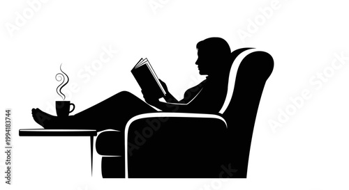 Man reading book on armchair relaxing.
