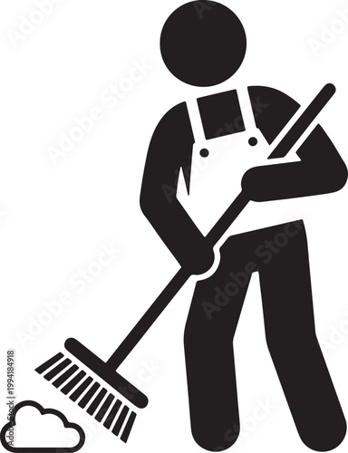 Man in overalls sweeps with a broom outdoors amidst clouds and dirt.