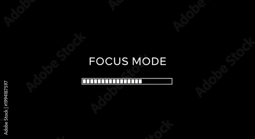 A digital loading bar with the text 'FOCUS MODE' above it on a black background, indicating a process or state.