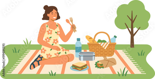 Woman enjoys outdoor picnic with food basket on blanket in park