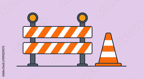 Construction Barrier with Warning Lights and a Traffic Cone Indicating Road Work