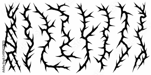 Black thorn branches and sharp spikes create a dangerous abstract pattern