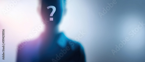 Blurred mysterious human silhouette with glowing question mark symbolizing identity, anonymity, unknown person.