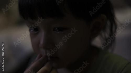 Toddler Cries With Runny Nose, A professional documentary clip of toddler sobbing with snot, small hands wiping face, ideal for parenting reality film or raw feeling documentary.