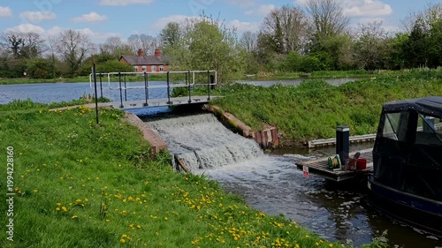 Water flowing into Kingswood Junction canal Marina from reservoir Warwickshire England UK