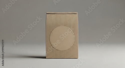 A plain cardboard box with a circular label in the center, on a neutral background, ready for branding