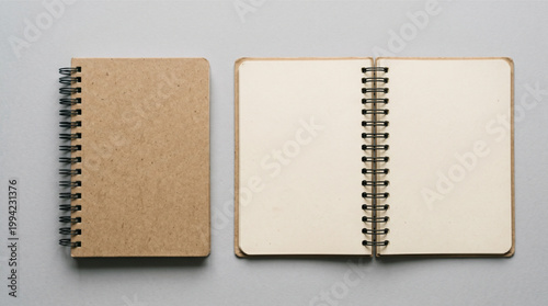 Spiral notebook mockup set featuring kraft paper cover closed and open with blank pages on a light gray background, minimalist stationery for office supplies, journaling, sketching, and branding.