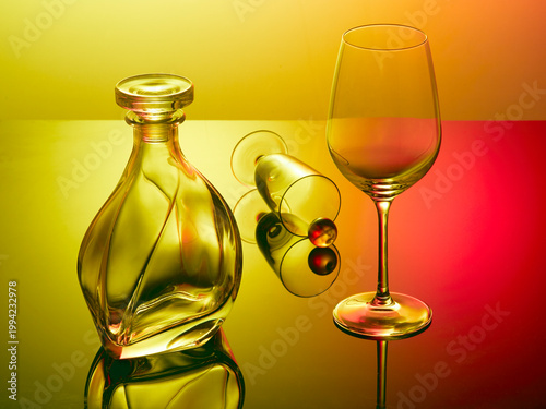 Still life with two glasses and decanter for alcohol