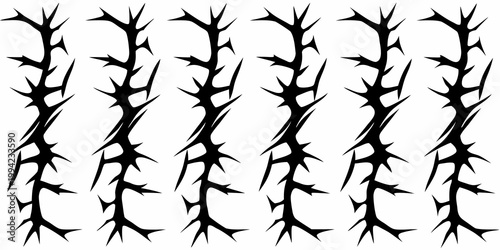 Abstract black thorns arranged in vertical repeating patterns